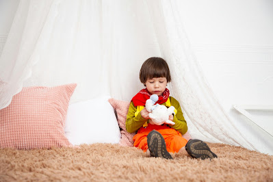 overstimulated child - Create a Calm-Down Corner