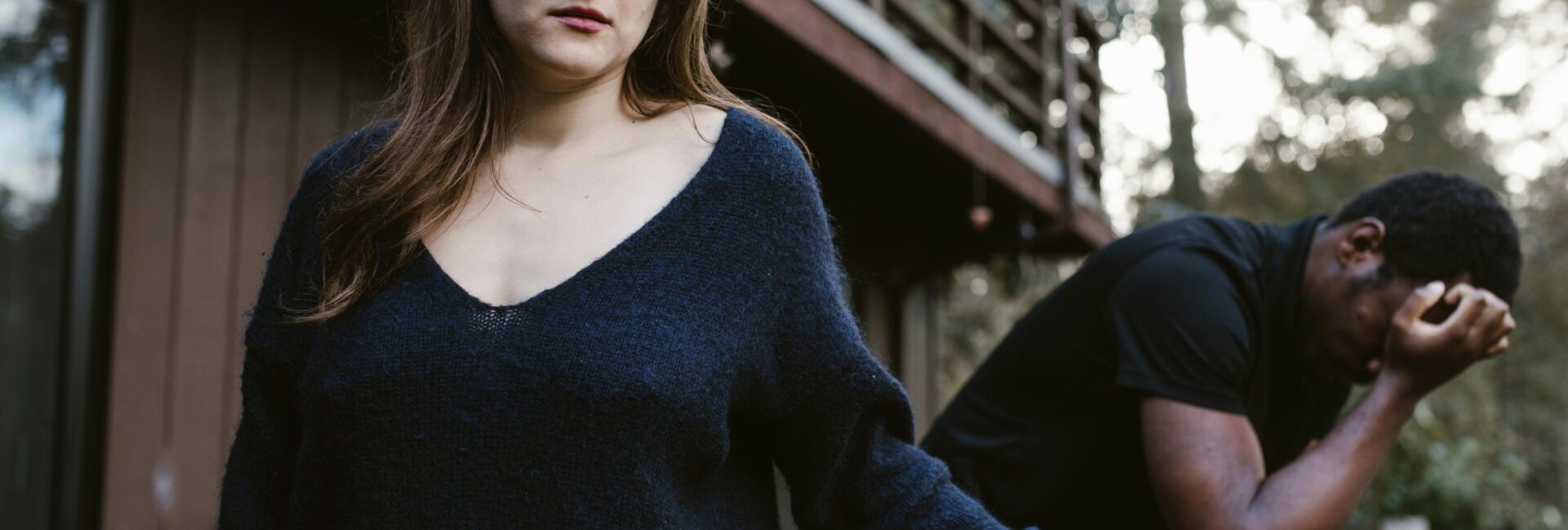 Sad couple sitting together reflecting on childlessness and emotional healing