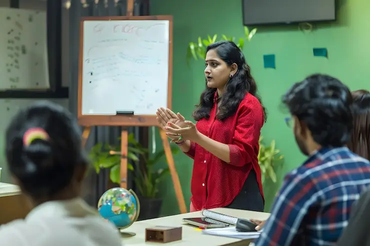 woman stands front whiteboard with globe it 979520 94992