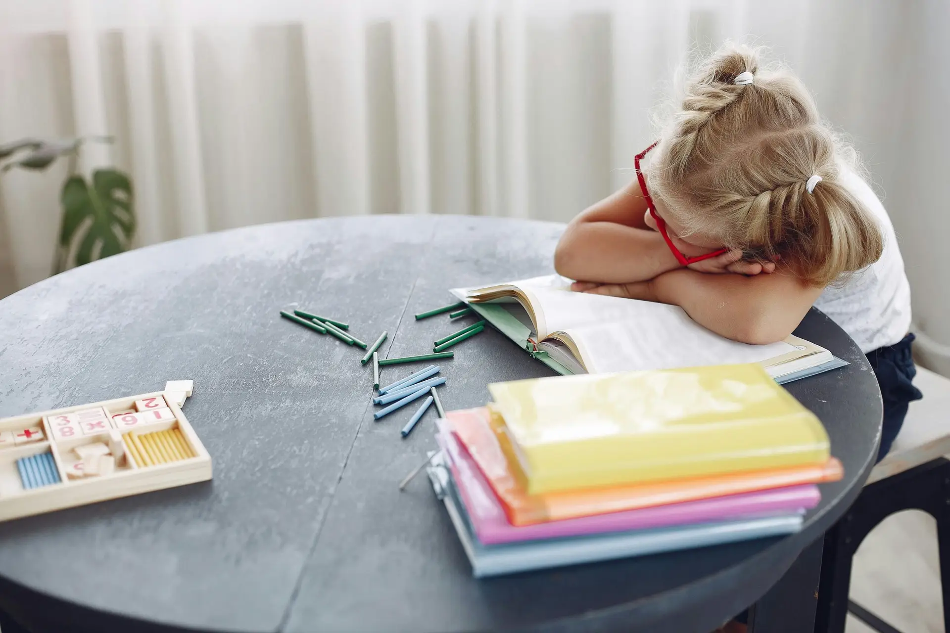 emotionally exhausted child sitting quietly